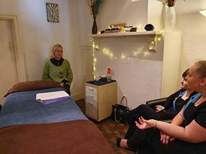 Taylor Made staff learning about Reiki